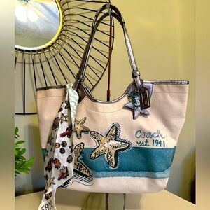 Coach limited edition Starfish tote with hang tags and tie.